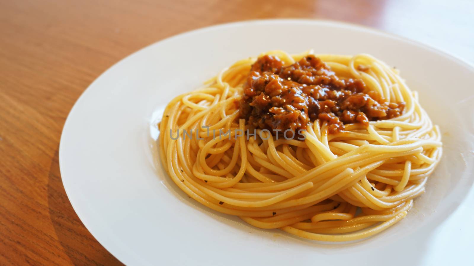 Plate of delicious spaghetti Bolognaise or Bolognese with sauce by natali_brill