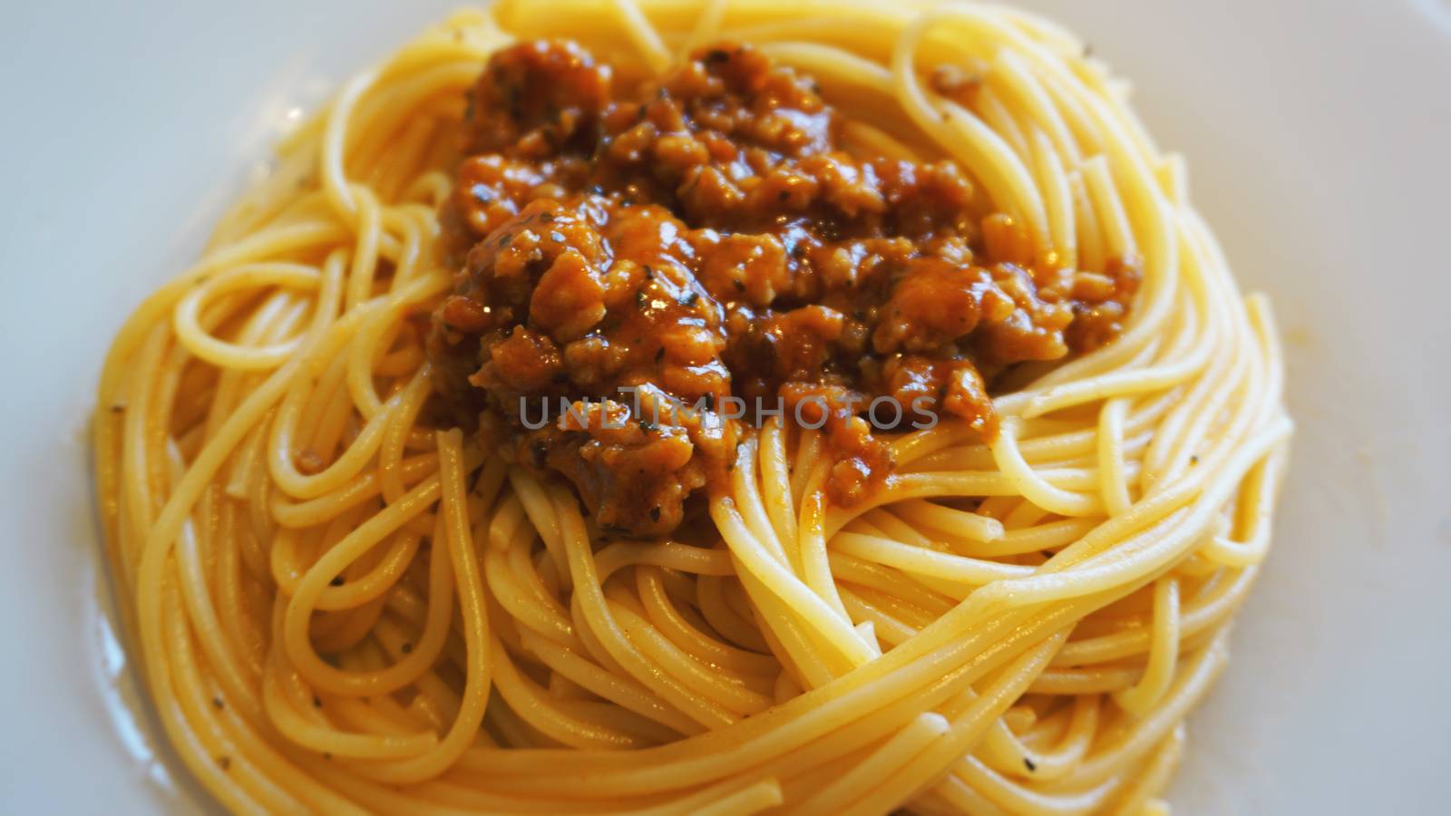Plate of delicious spaghetti Bolognaise or Bolognese with sauce by natali_brill