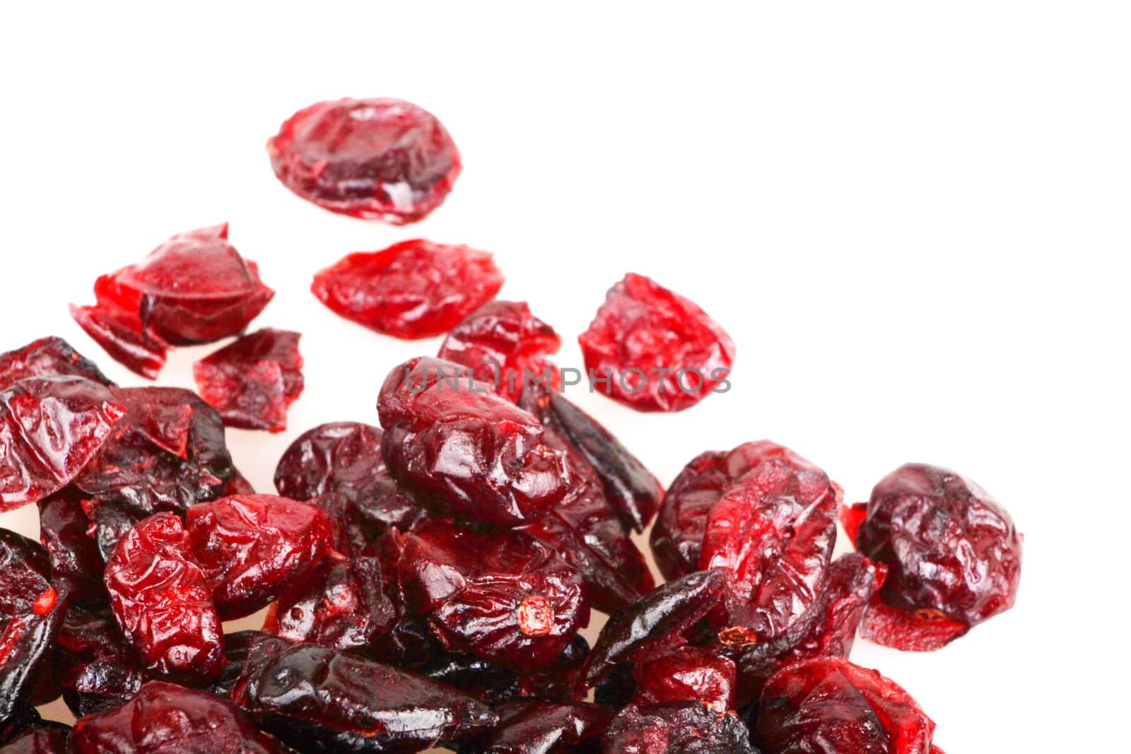 Close-up Of A Pile Of Cranberries On A White Background