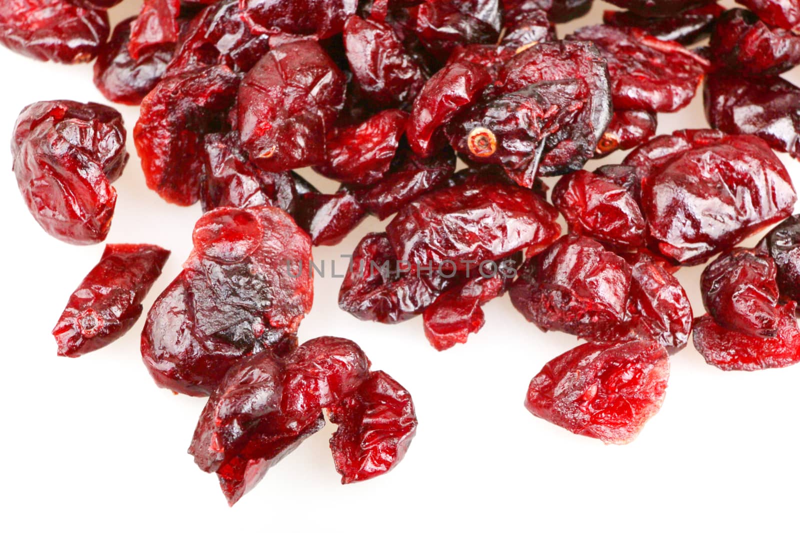 Close-up Of A Pile Of Cranberries On A White Background