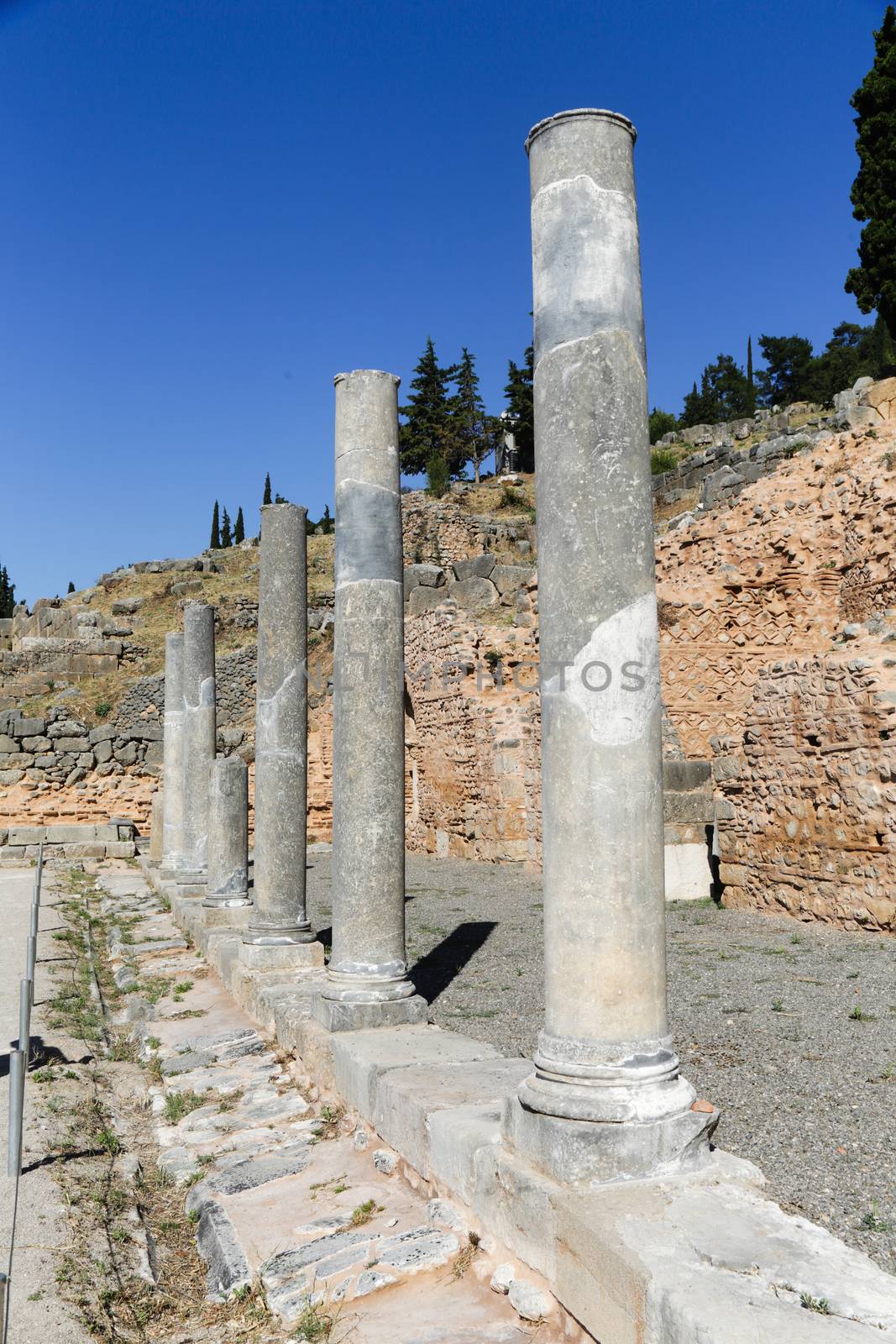 The ruins in Delphi, an archaeological site in Greece at the Mount Parnassus. Delphi is famous by the oracle at the sanctuary dedicated to Apollo. UNESCO World heritage