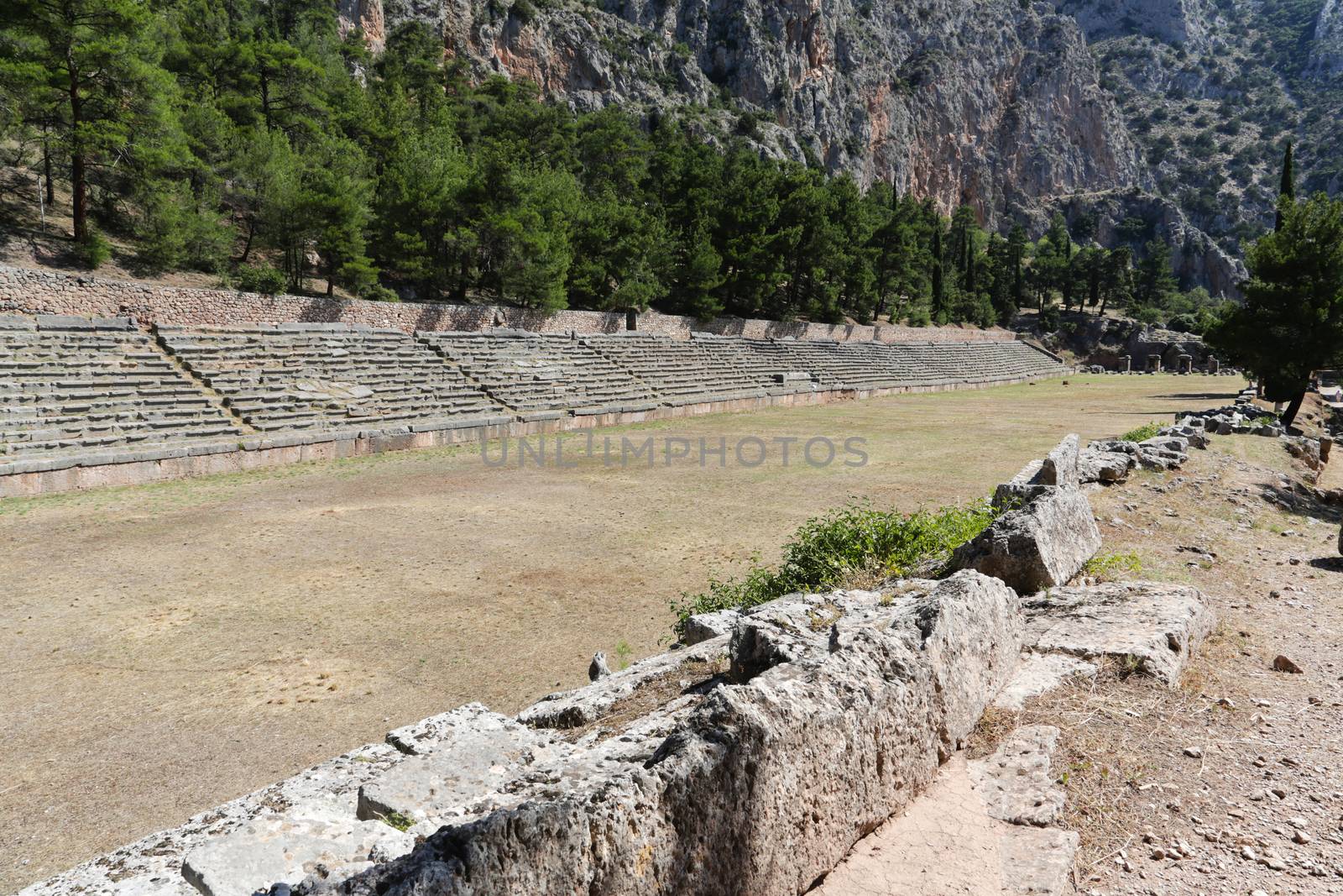 The ruins in Delphi, an archaeological site in Greece at the Mount Parnassus. Delphi is famous by the oracle at the sanctuary dedicated to Apollo. UNESCO World heritage