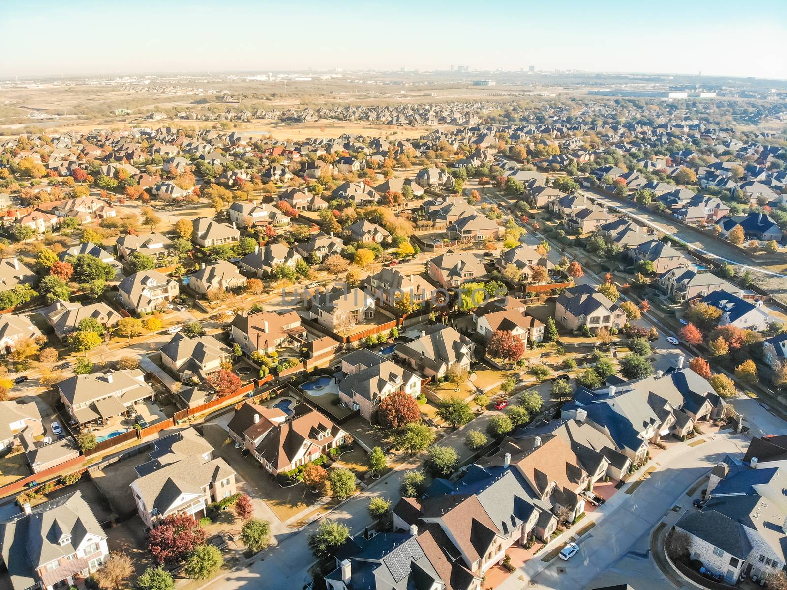 Aerial view new development neighborhood in Cedar Hill, Texas, USA in morning fall with colorful leaves. A city in Dallas and Ellis counties located approximately 16 miles southwest of downtown Dallas