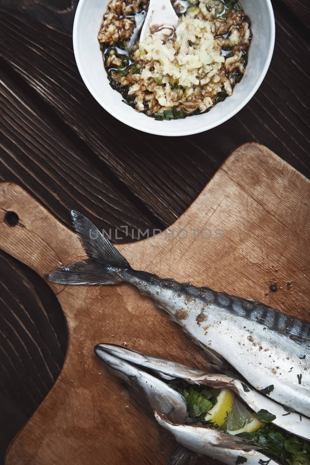 Fish stuffed by lemon and herbs with pepper