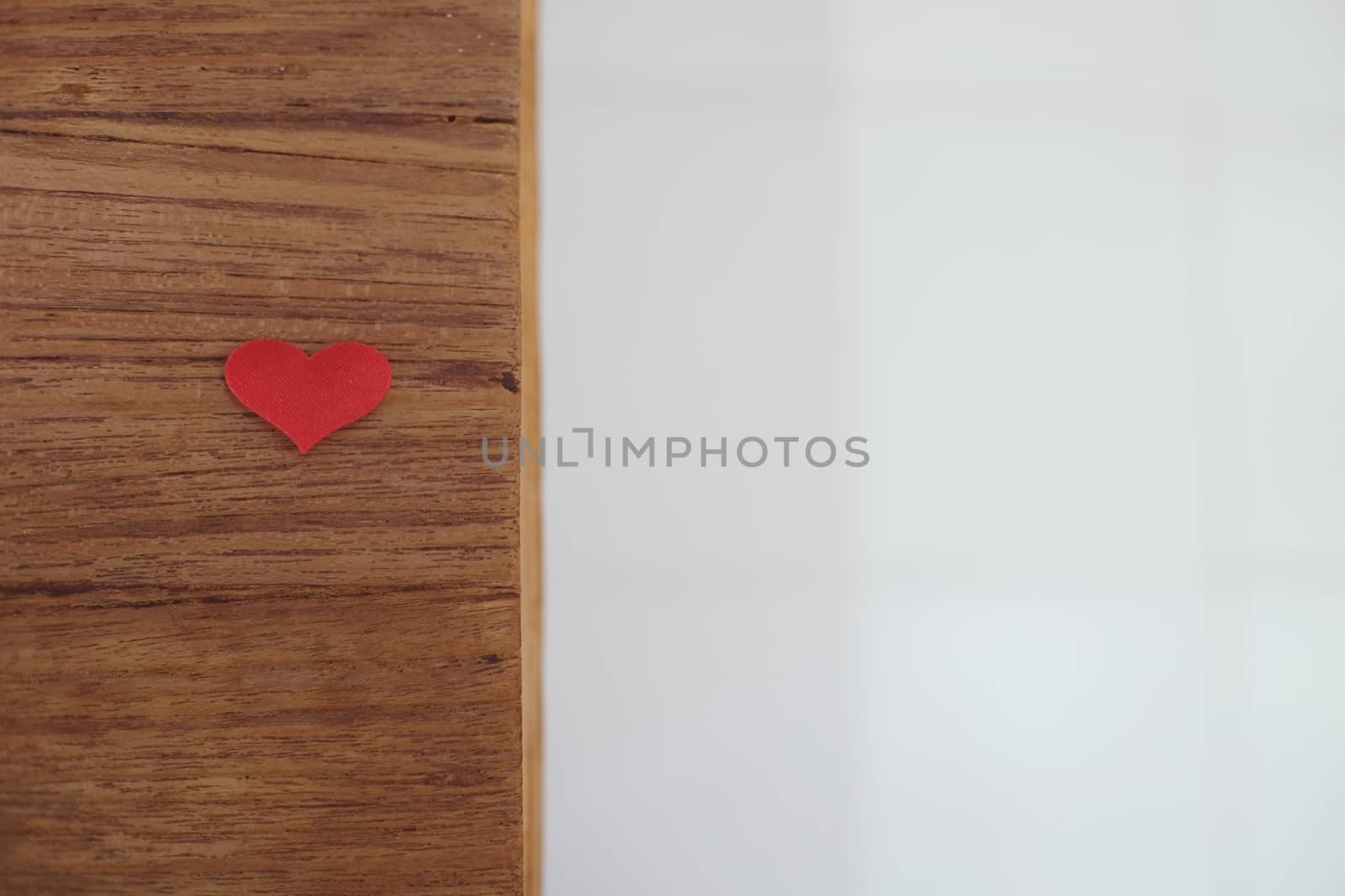 Love Valentines day background with red hearts. copy space on wooden table.