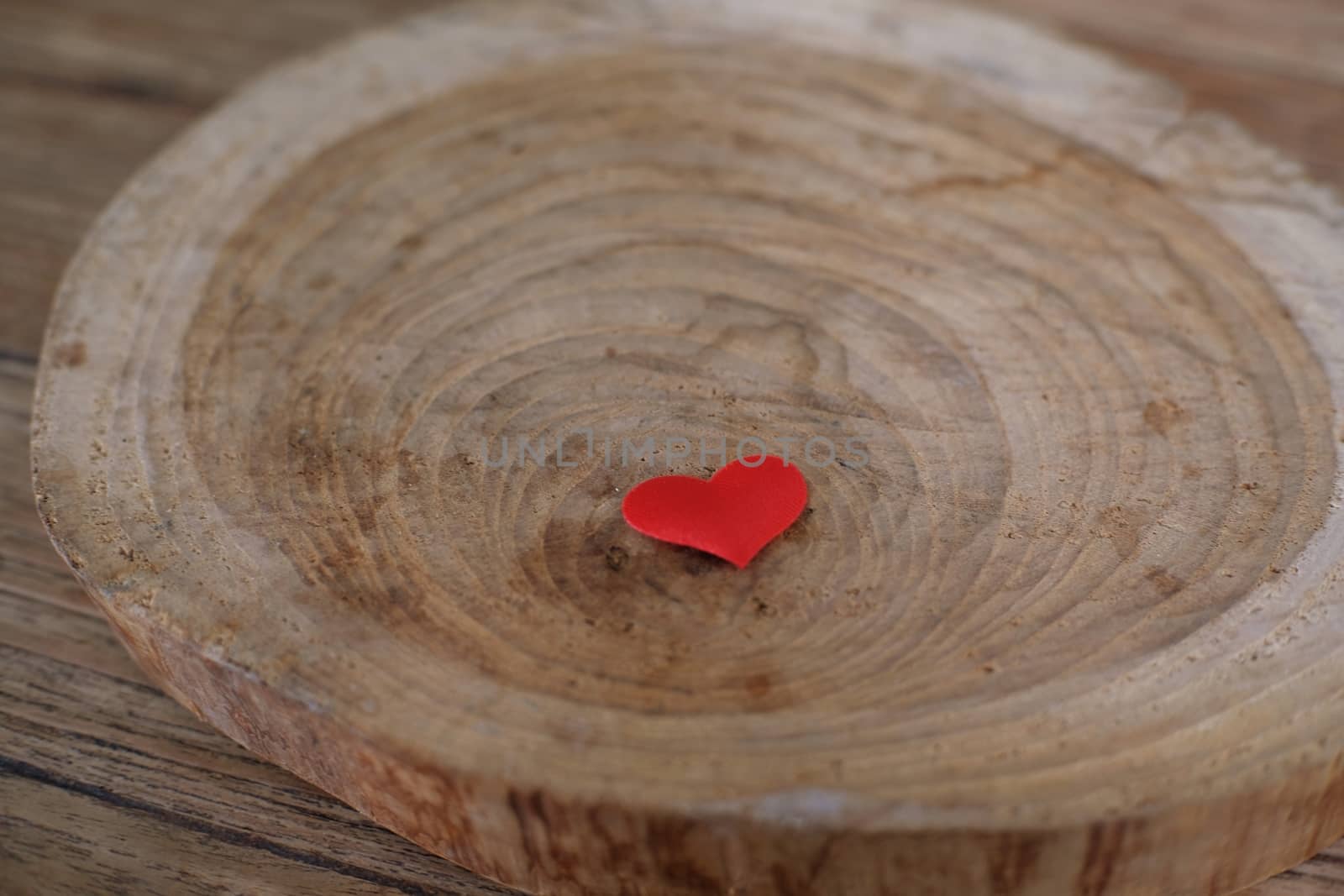 Love Valentines day background with red hearts. copy space on wooden table.