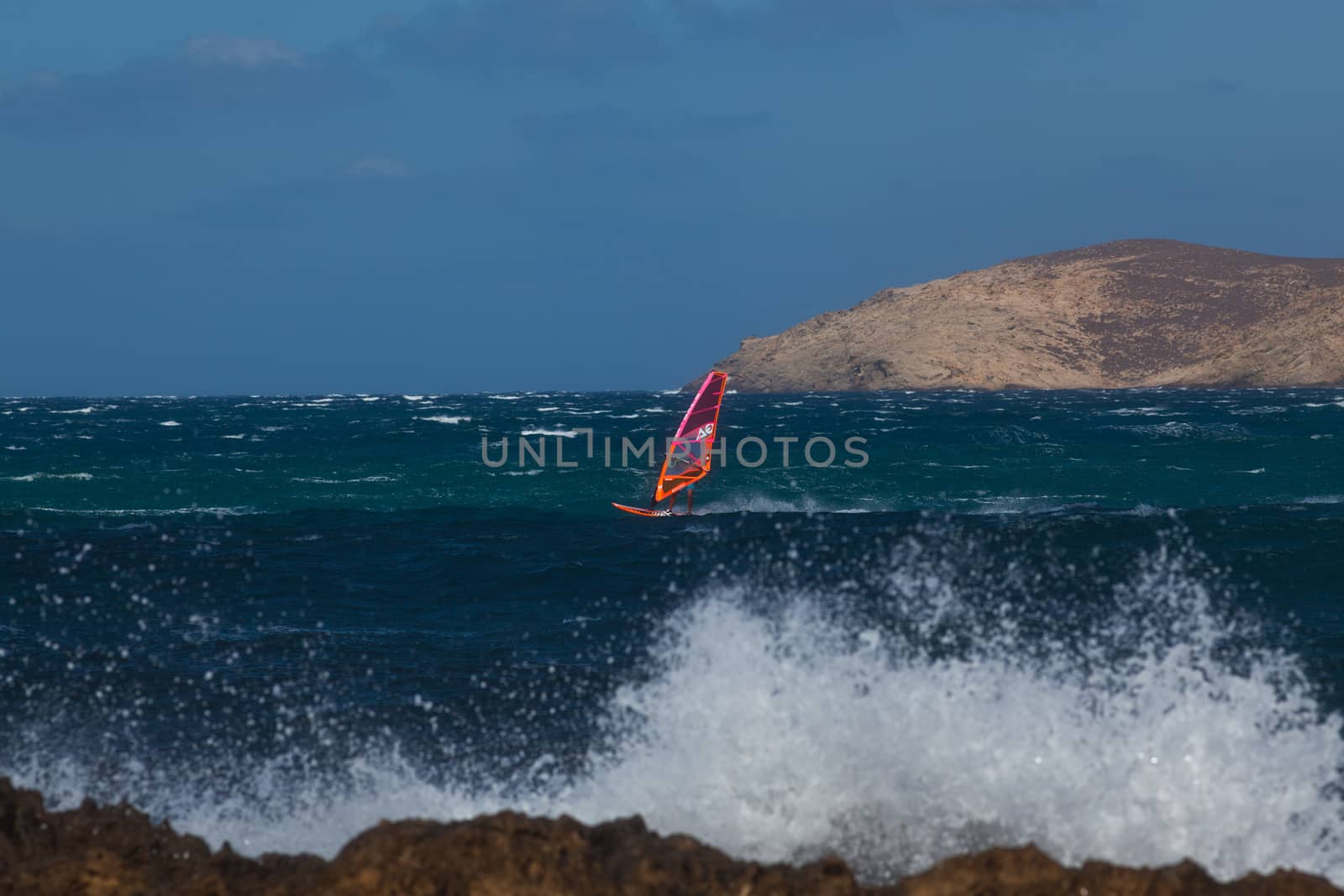kite surfing on blue waves
