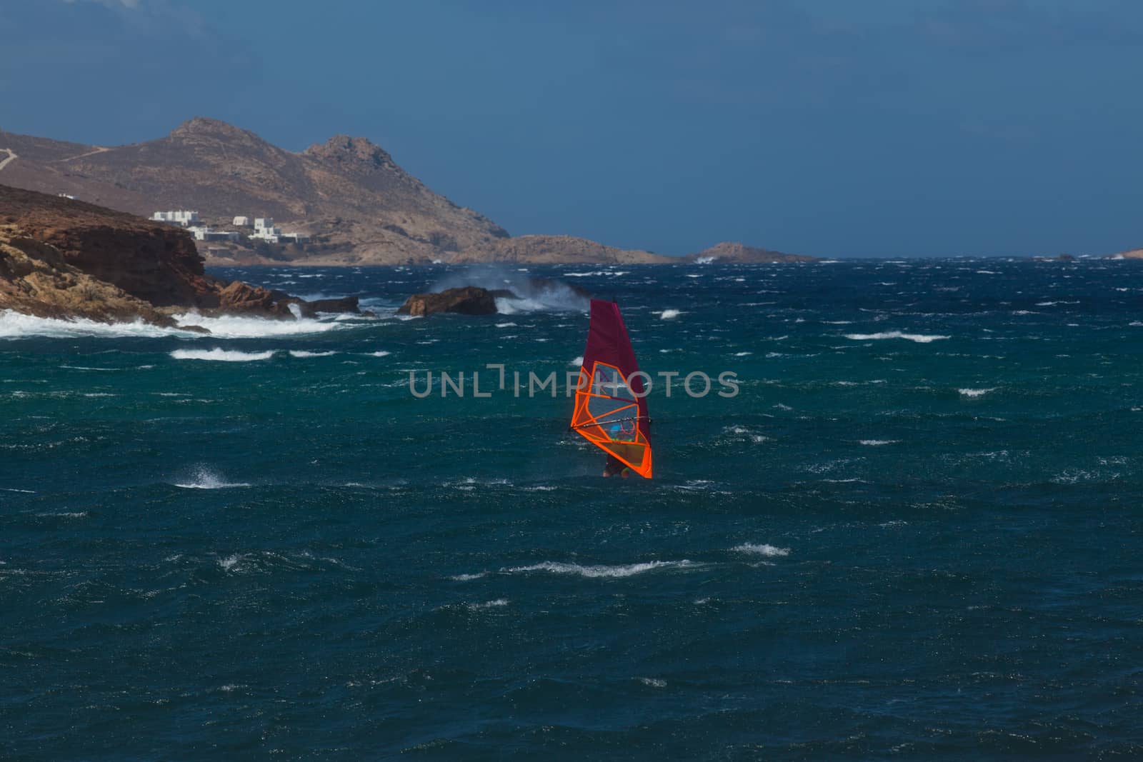 kite surfing on blue waves