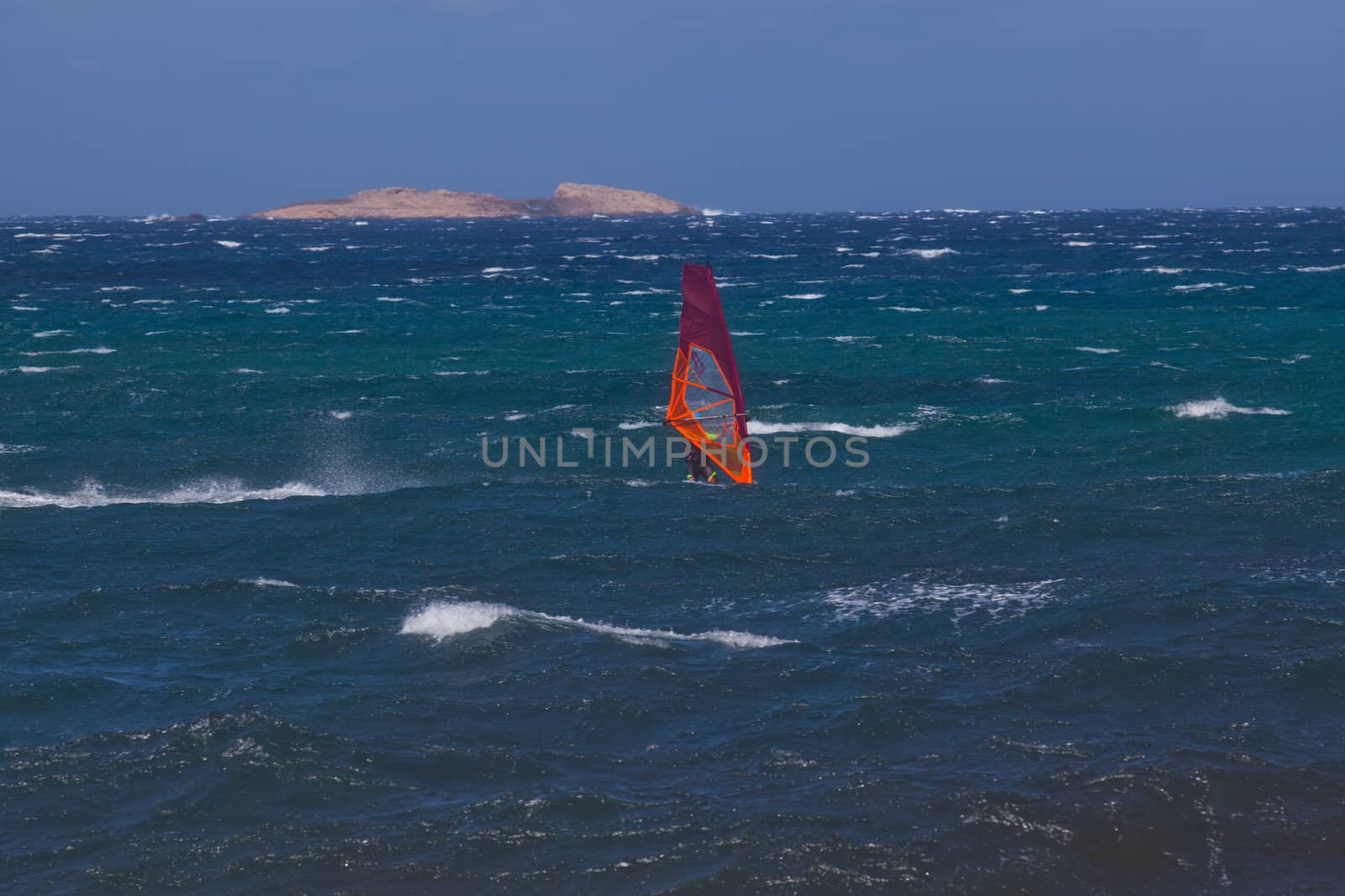 kite surfing on blue waves