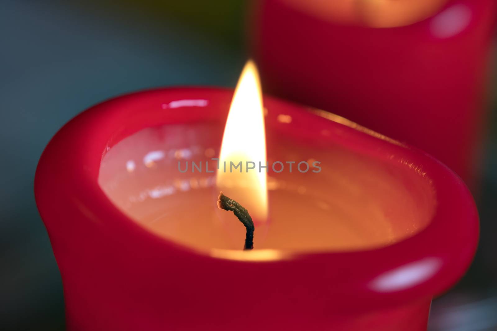 Two red burning candels  by w20er