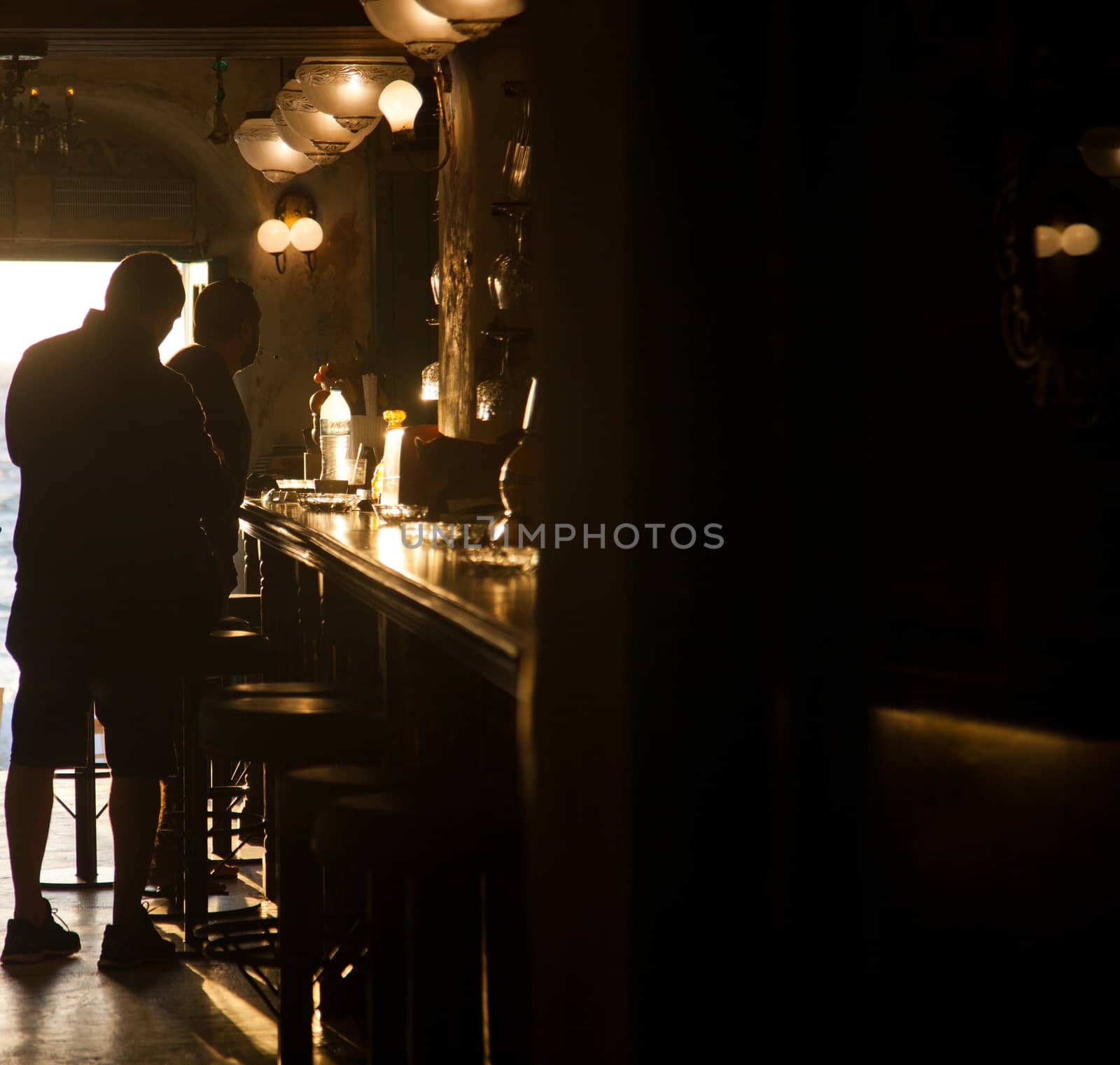 sunset bar by the beach - focus on table