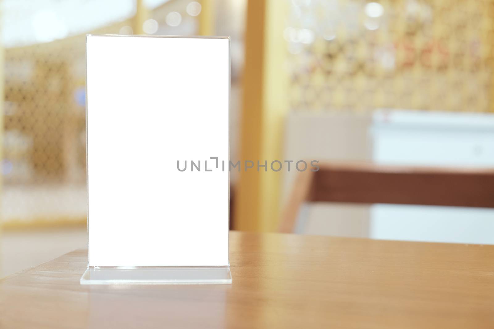 Menu frame standing on wood table in Bar restaurant cafe. space for text marketing promotion