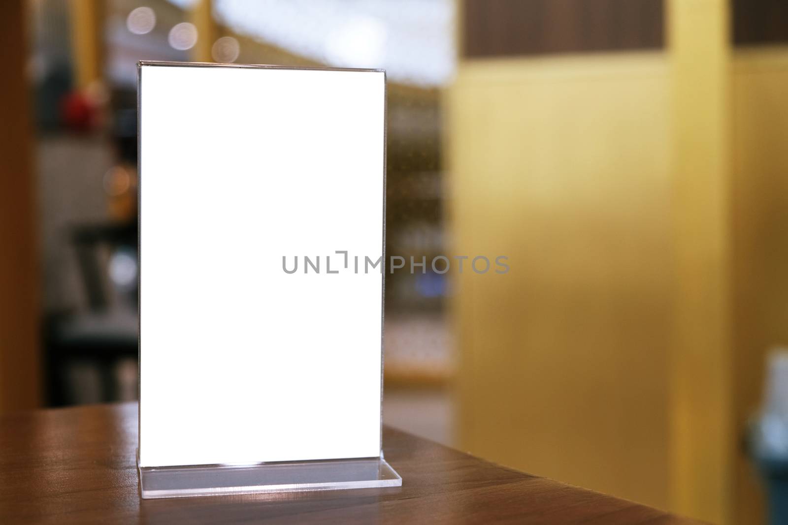 Menu frame standing on wood table in Bar restaurant cafe. space for text marketing promotion