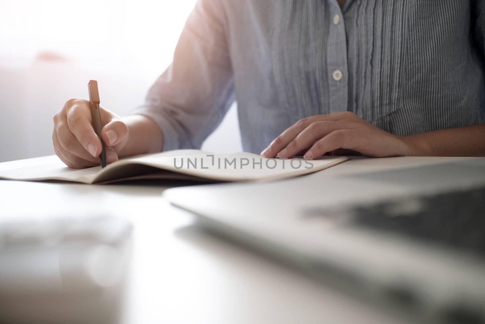 Business accounting women work with calculator and Laptop. Finan by peandben