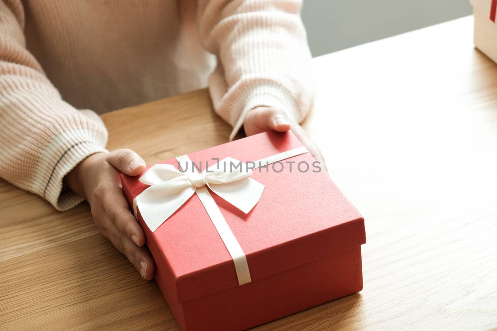 Valentine present. Gift box and red ribbon for romantic couple