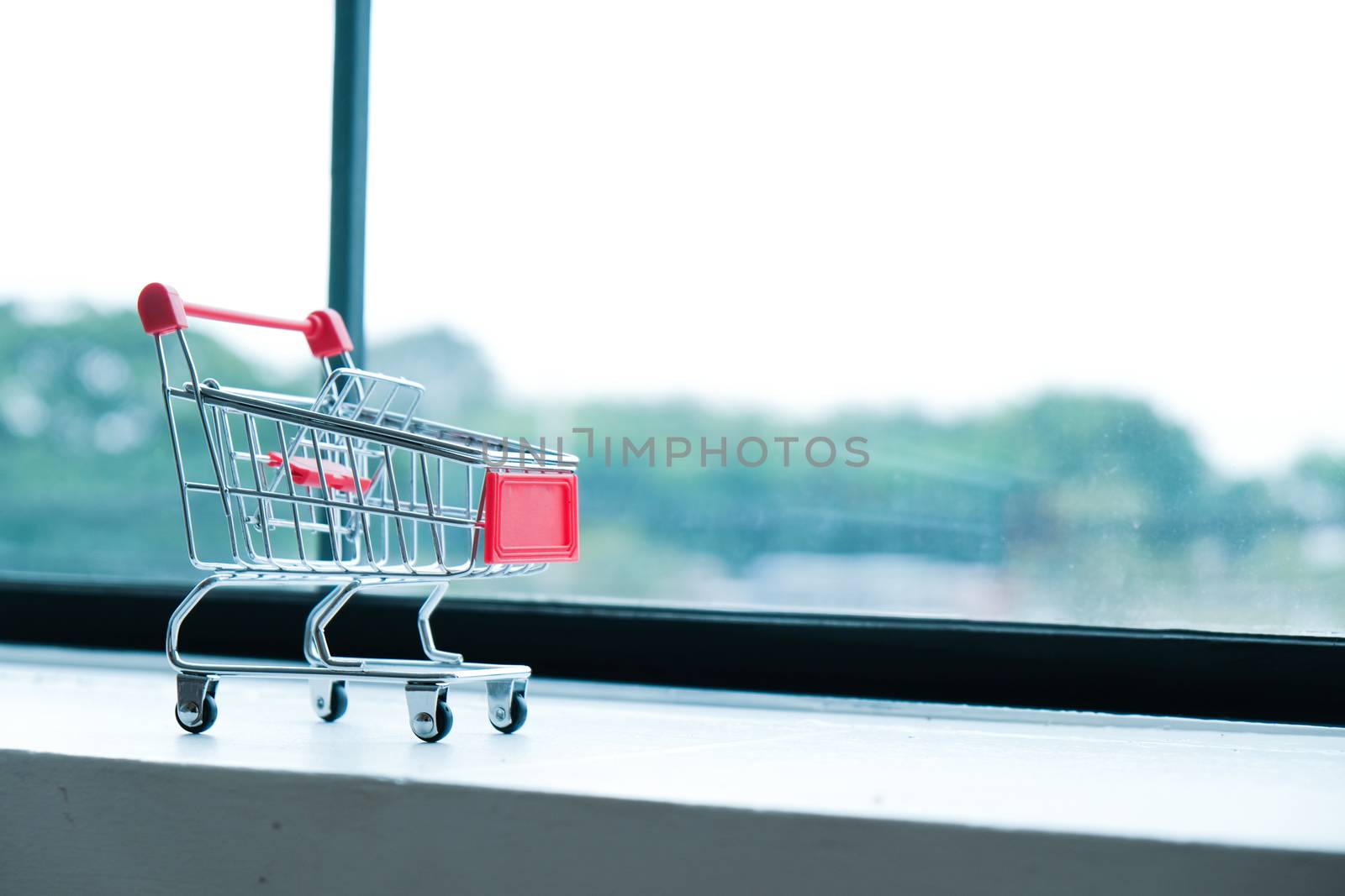 Small shopping cart with Laptop for Internet online shopping con by peandben