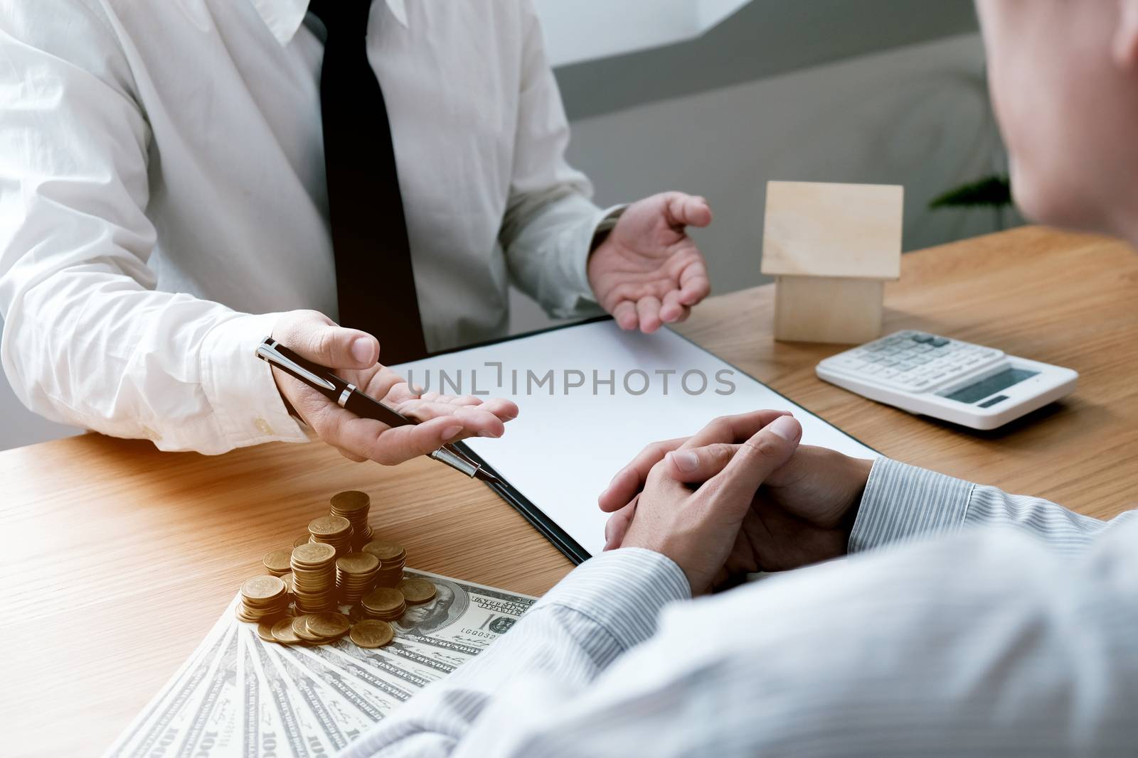 Business people signing contract making a deal with real estate agent Concept for consultant and home insurance concept