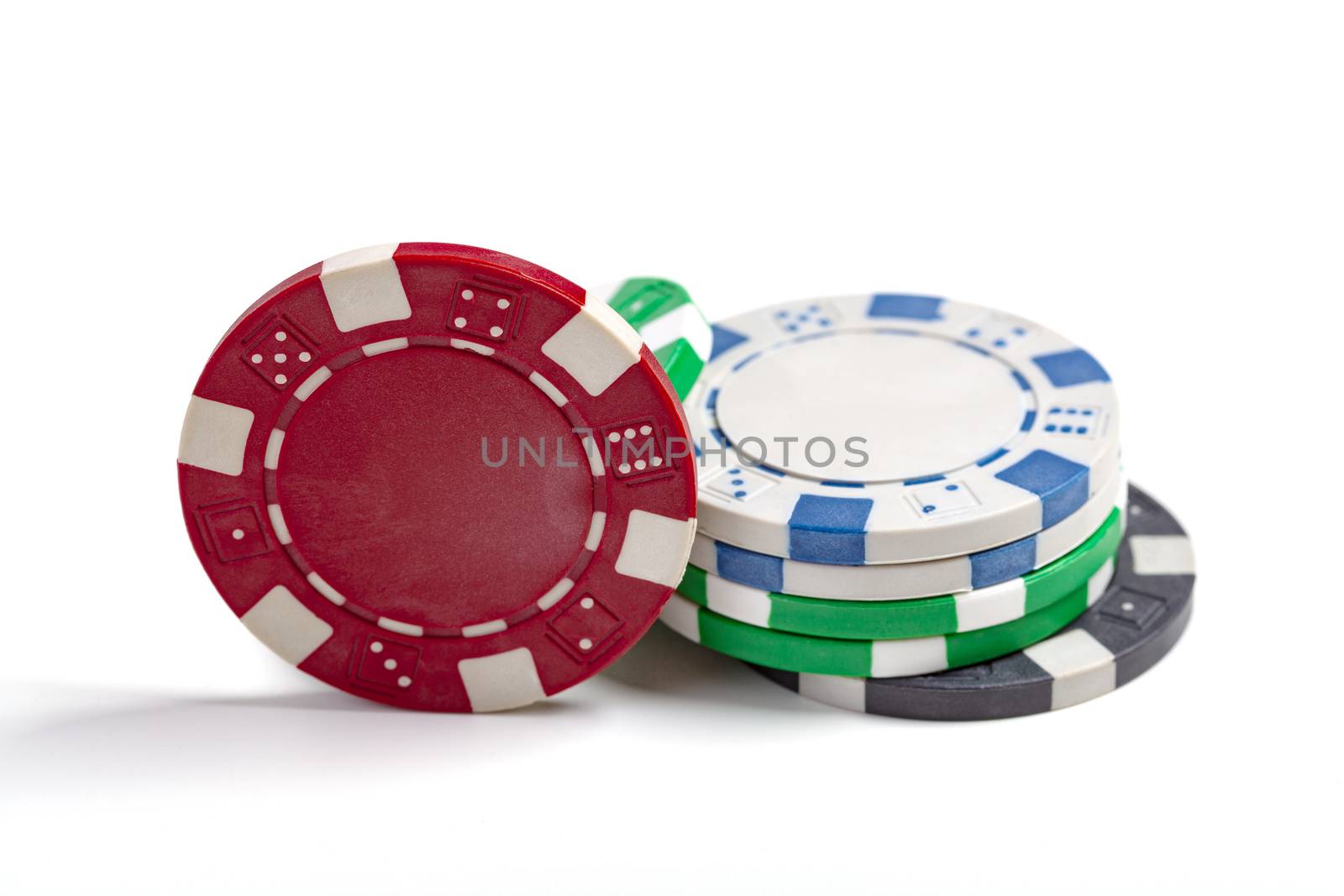 Red Green White and Blue Casino Chips Isolated On White Background