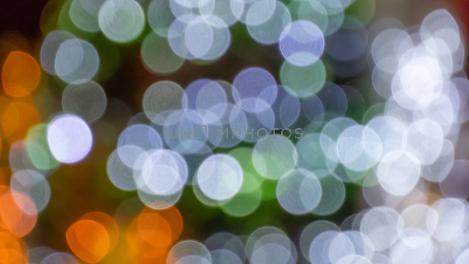 Abstract & Festive background with bokeh defocused lights