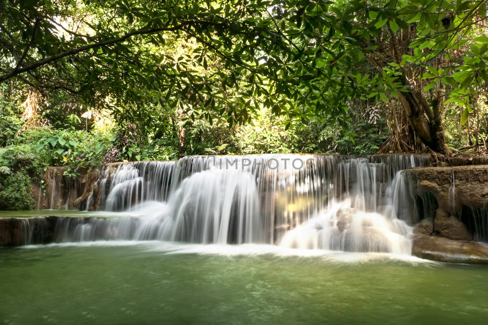 Fresh waterfall in rainforest at National Park, Thailand.