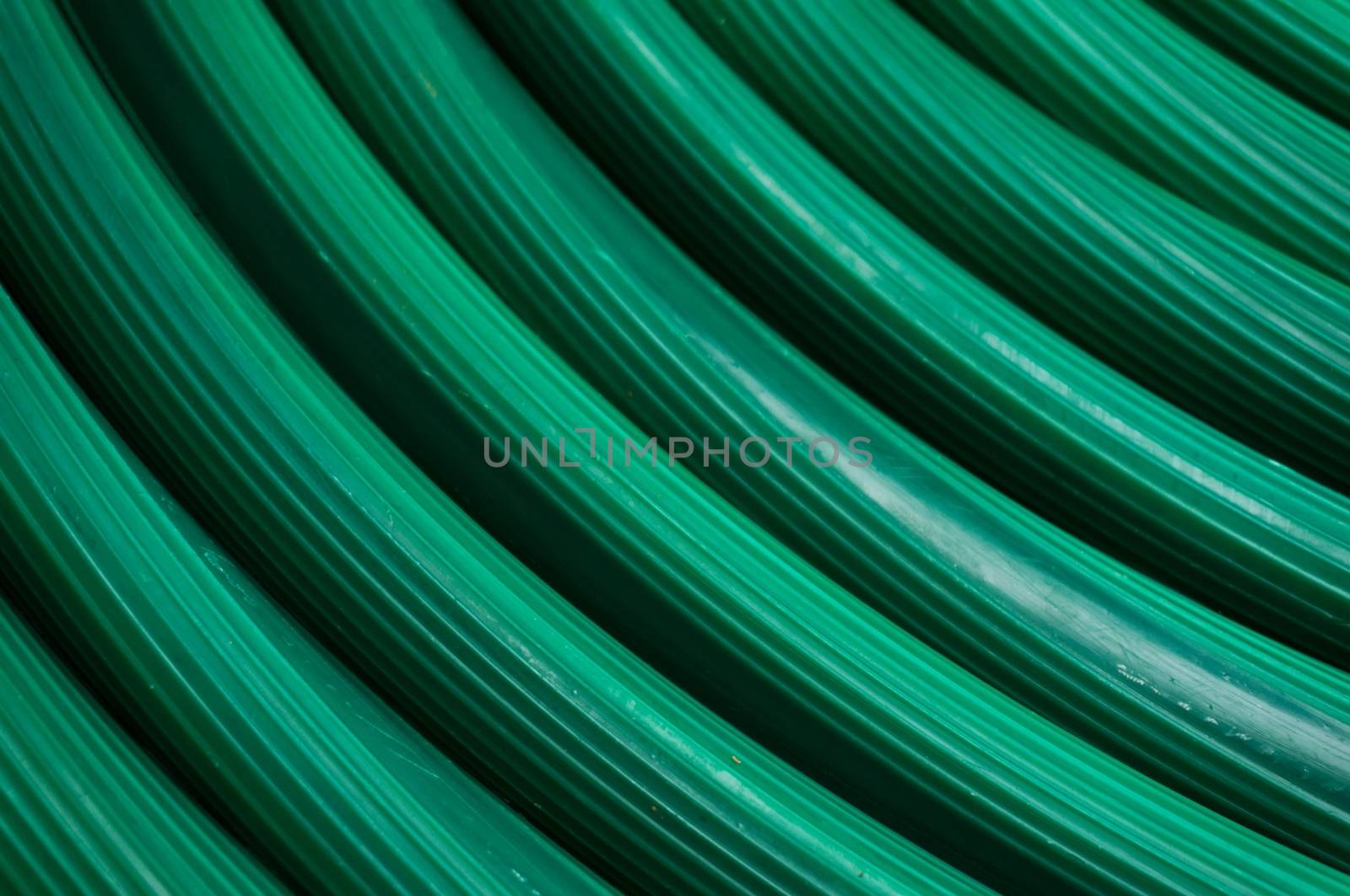 Abstract of Green Rubber tube Texture for watering plants in the by peandben