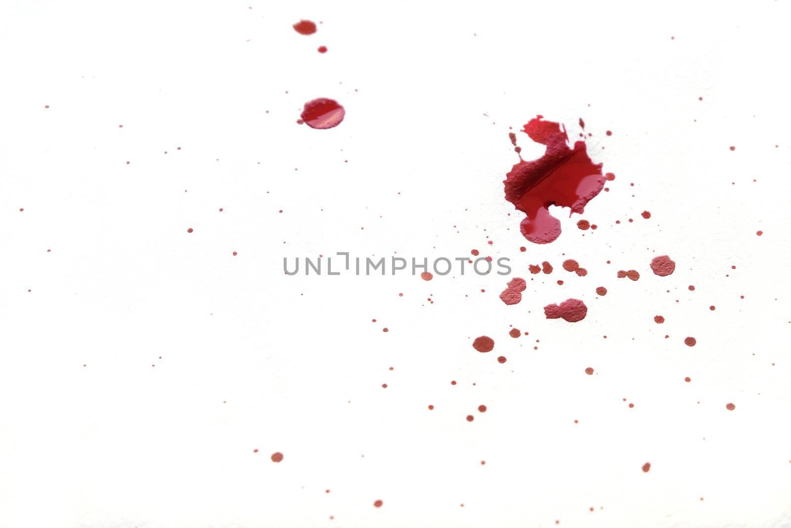 Blood splatters on white background. by peandben