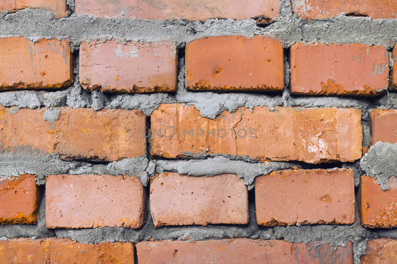 Fresh brickwork wall backdrop. Brick repair old decor background. Architecture texture design