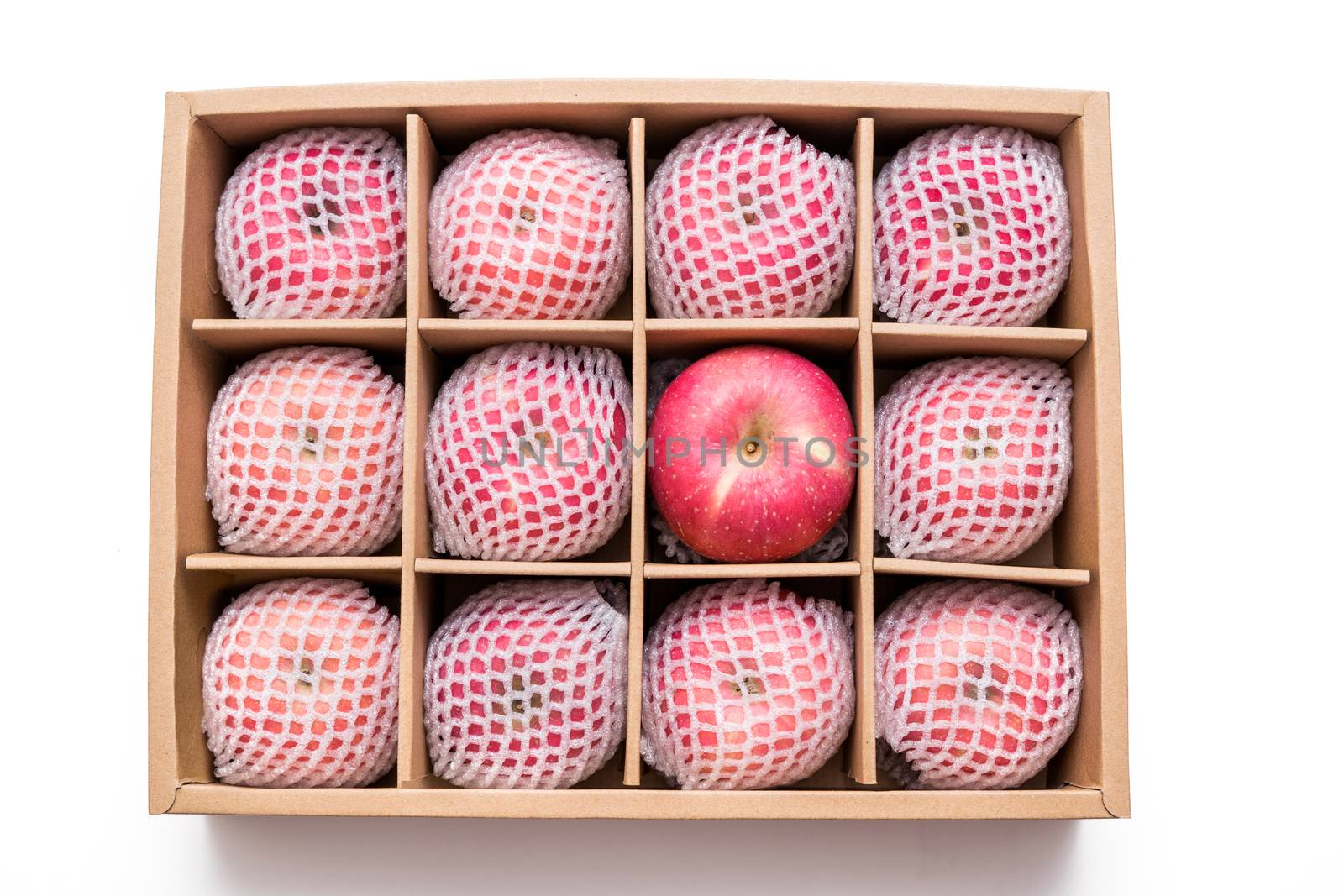 red apples with shockproof foam net wrap in paper box isolated on white background