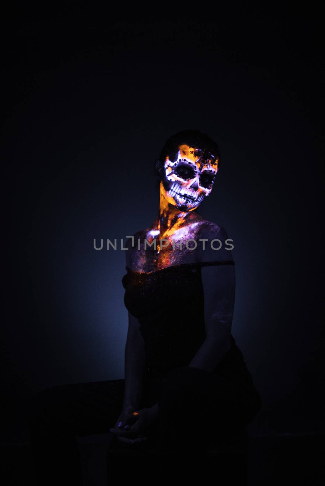 Girl's face painted UV skull by Multipedia