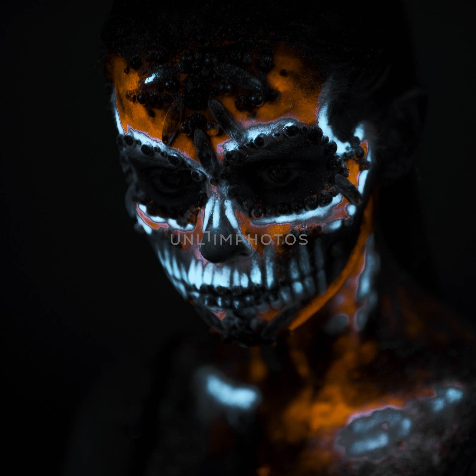 Girl's face painted UV skull by Multipedia