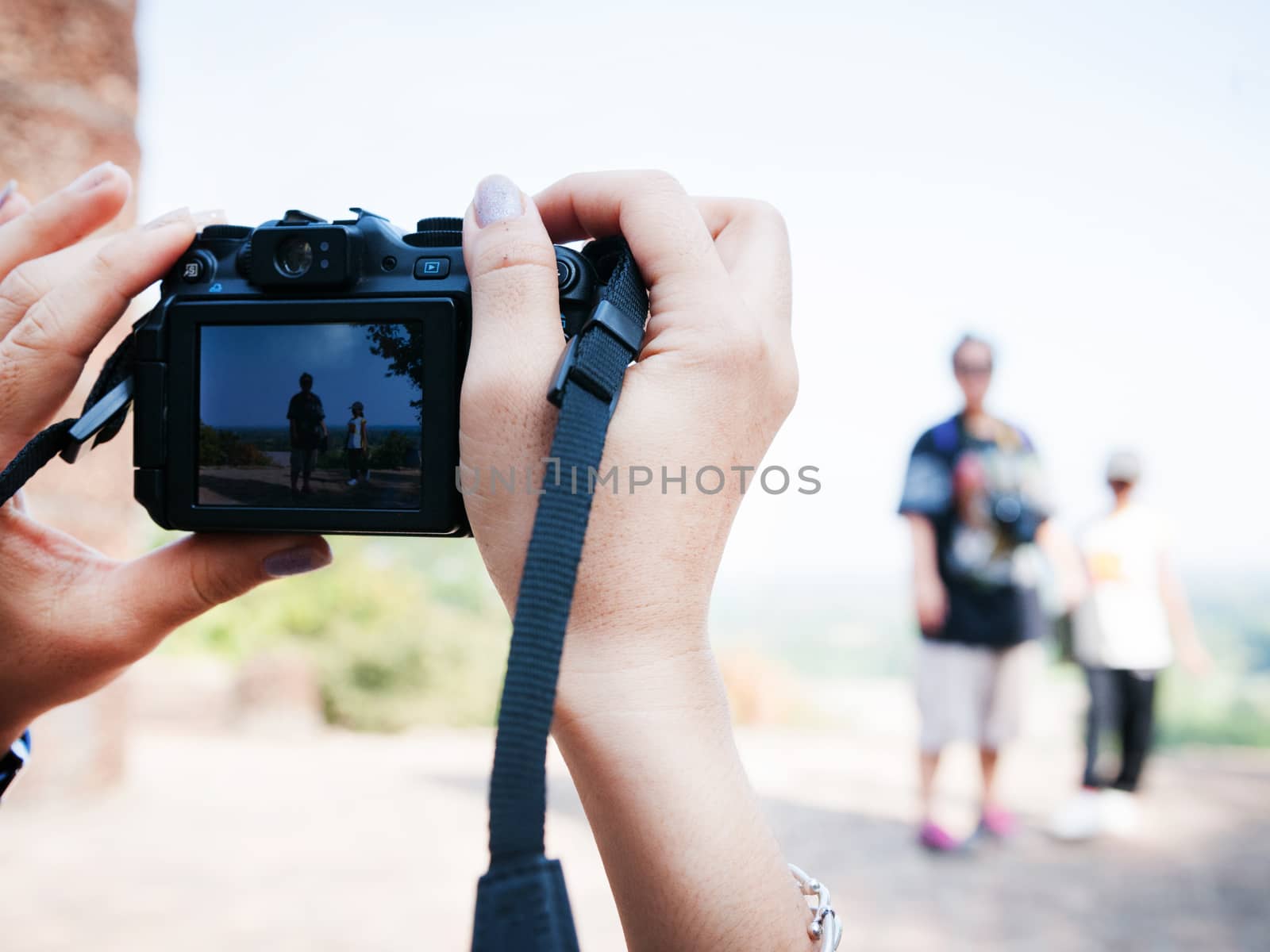 hand holding of camera take a photo, travel conception
