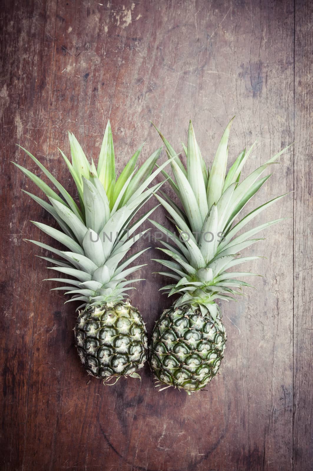 pineapple on wooden background