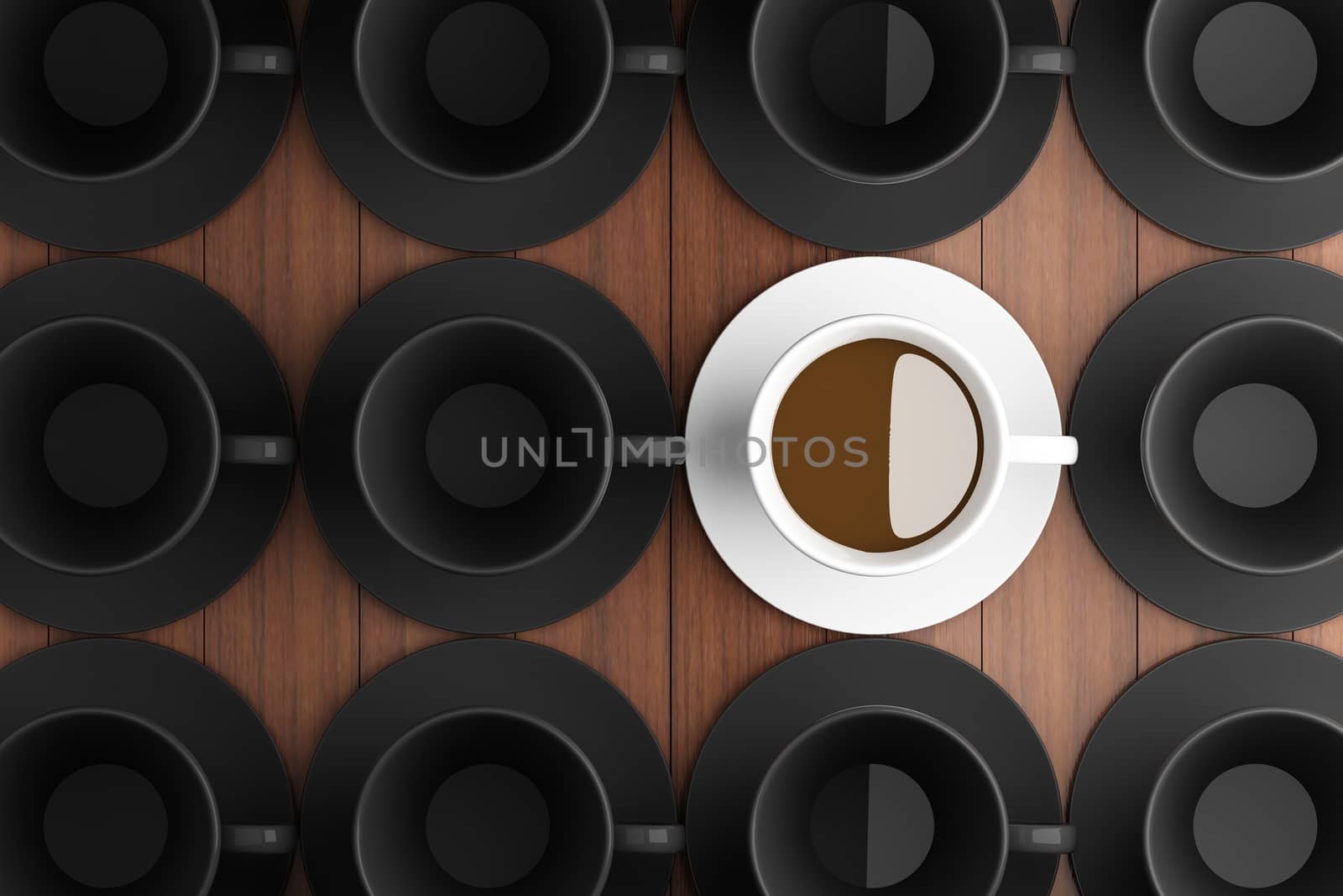 White coffee cup in the middle of a black coffee cup.