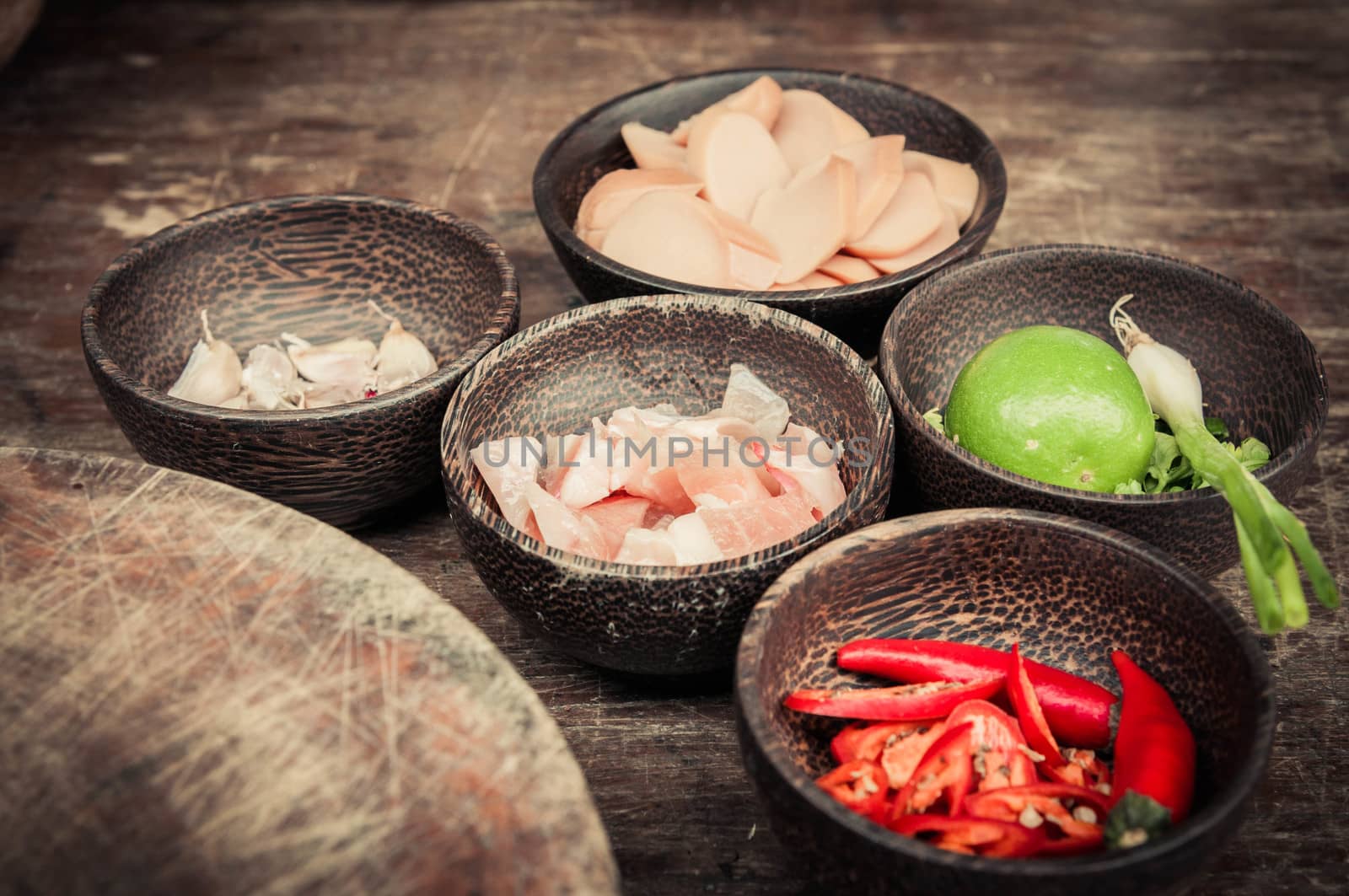 ingredient of raw food in small wood cup closeup