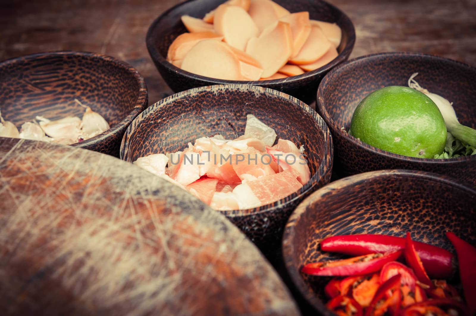 ingredient of raw food in small wood cup closeup