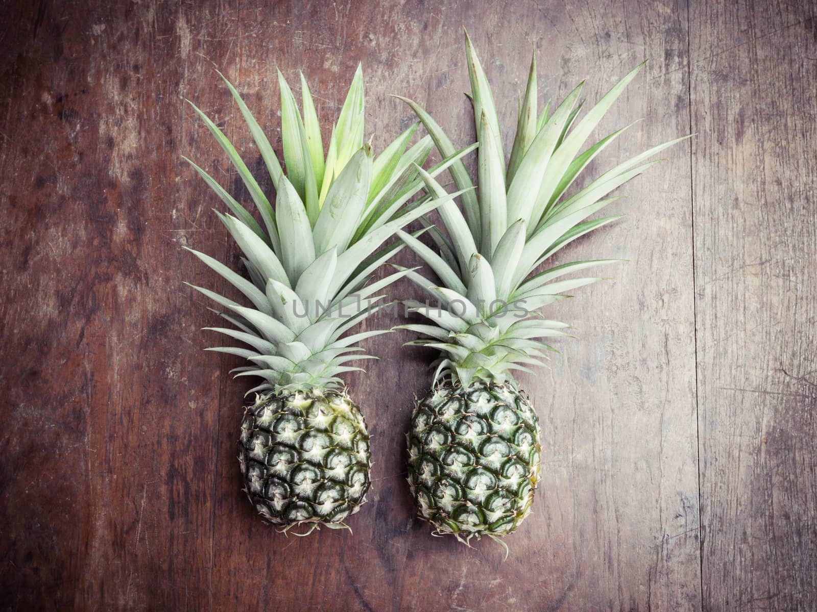 pineapple on wooden background