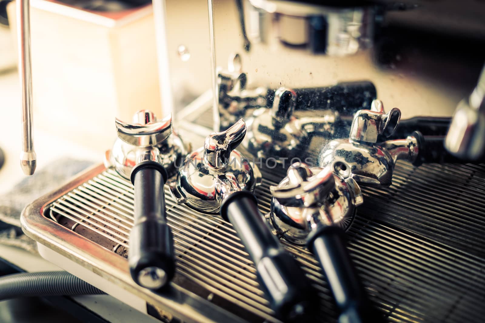 closeup of portafilter with coffee machine