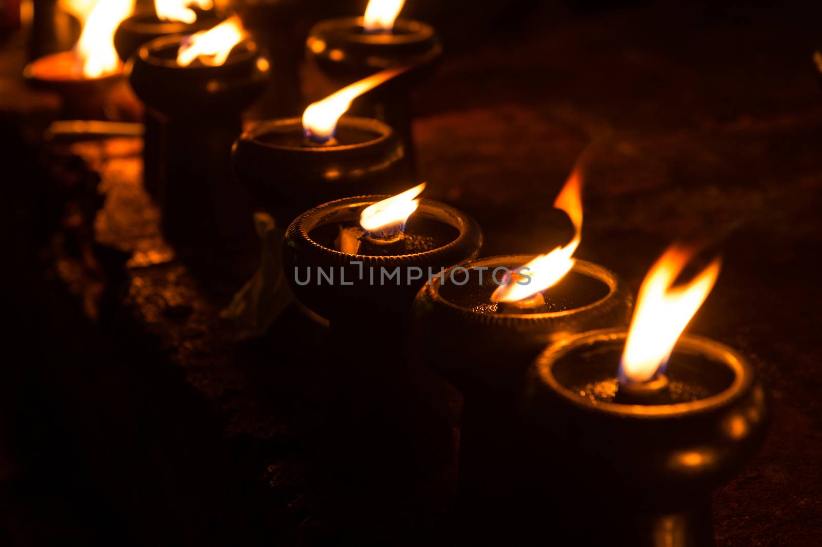 Closeup of candle light by sayhmog