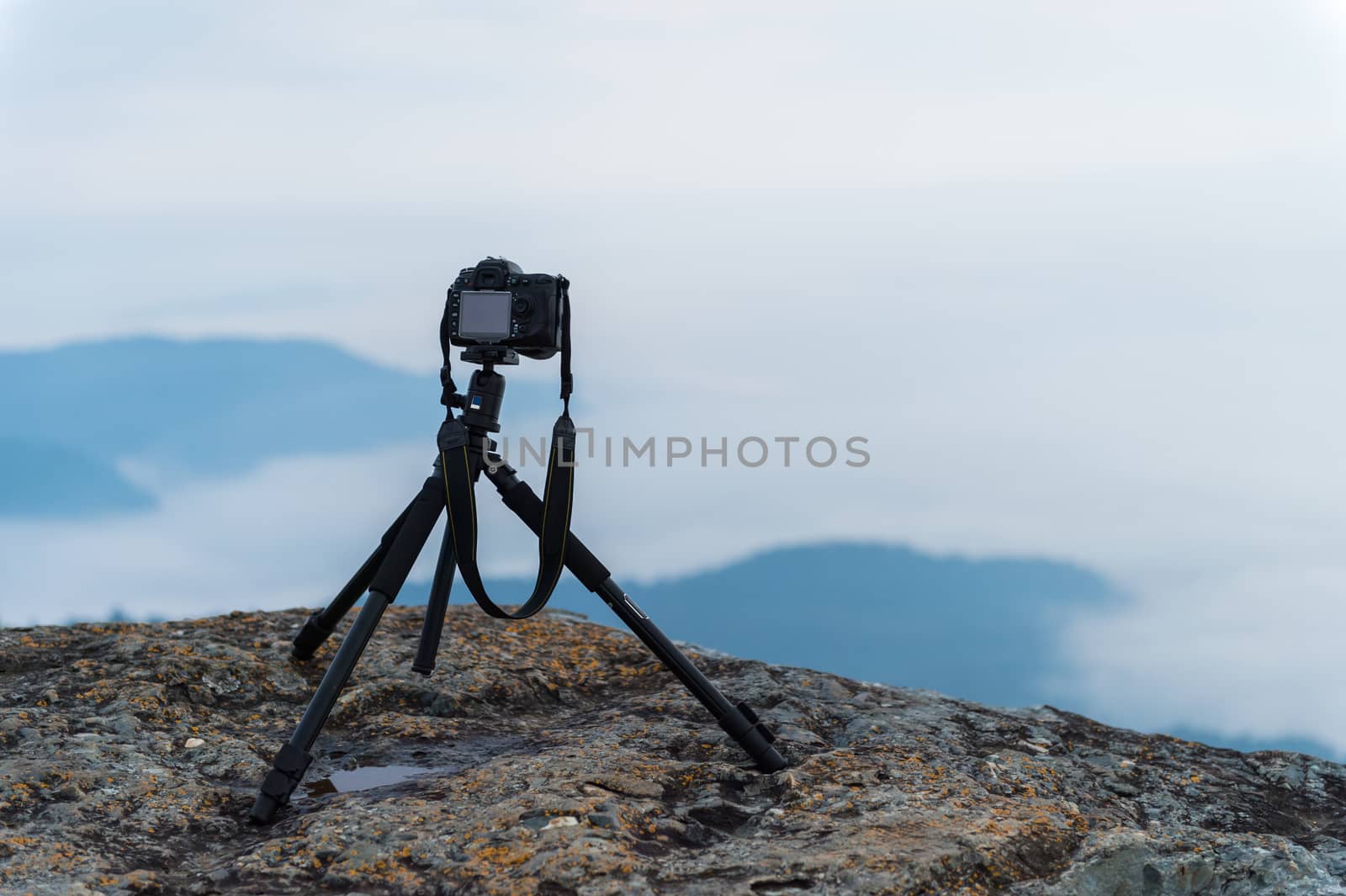 closeup of camera take a photo on mountain