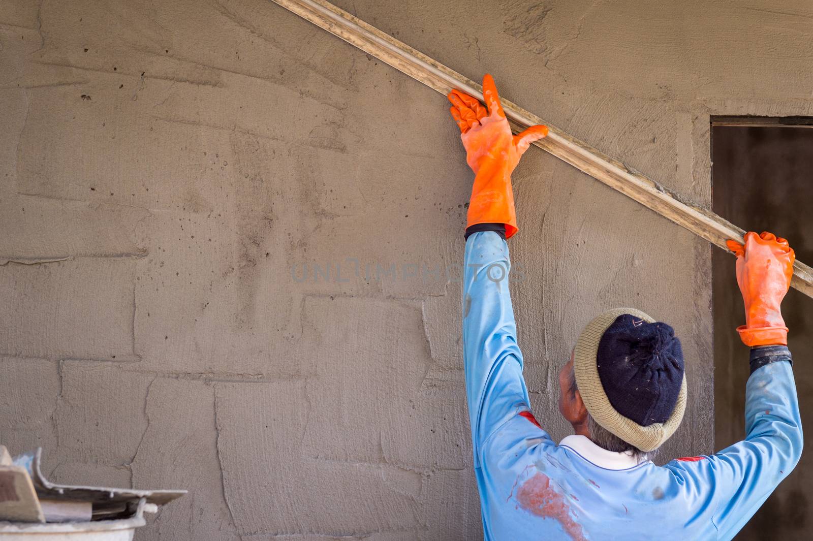 plasterer man and his job