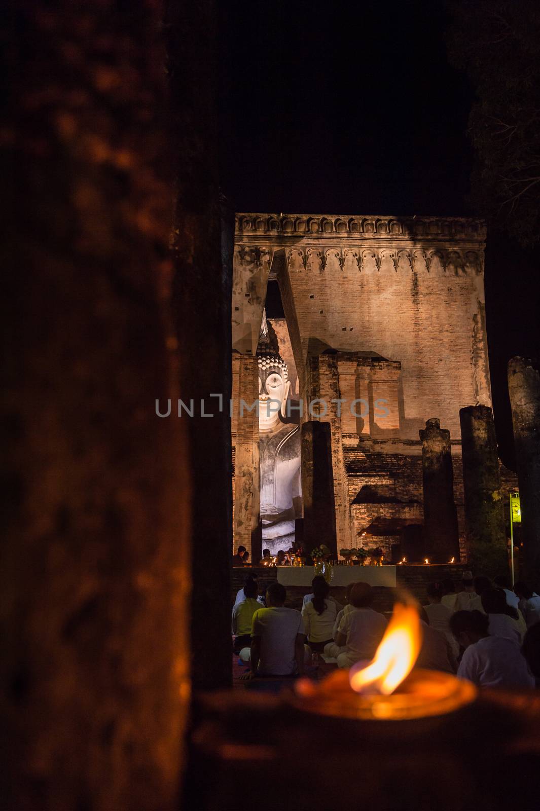 Closeup of buddha sculpture of Wat Si Chum from Sukhothai, Thail by sayhmog