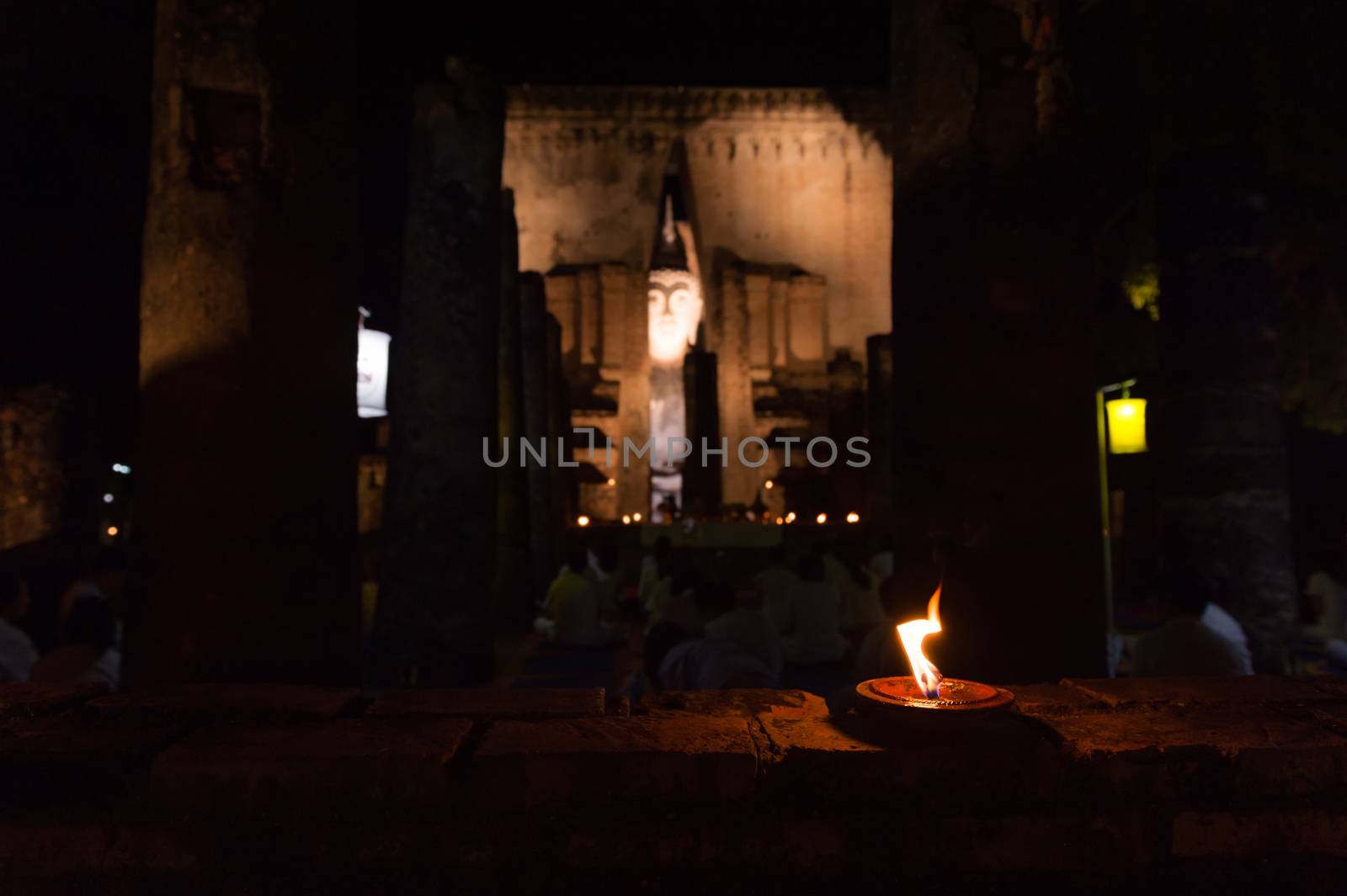 Closeup of candle in the temple by sayhmog