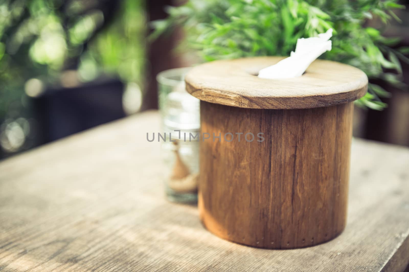 closeup of tissue paper in wood circle box