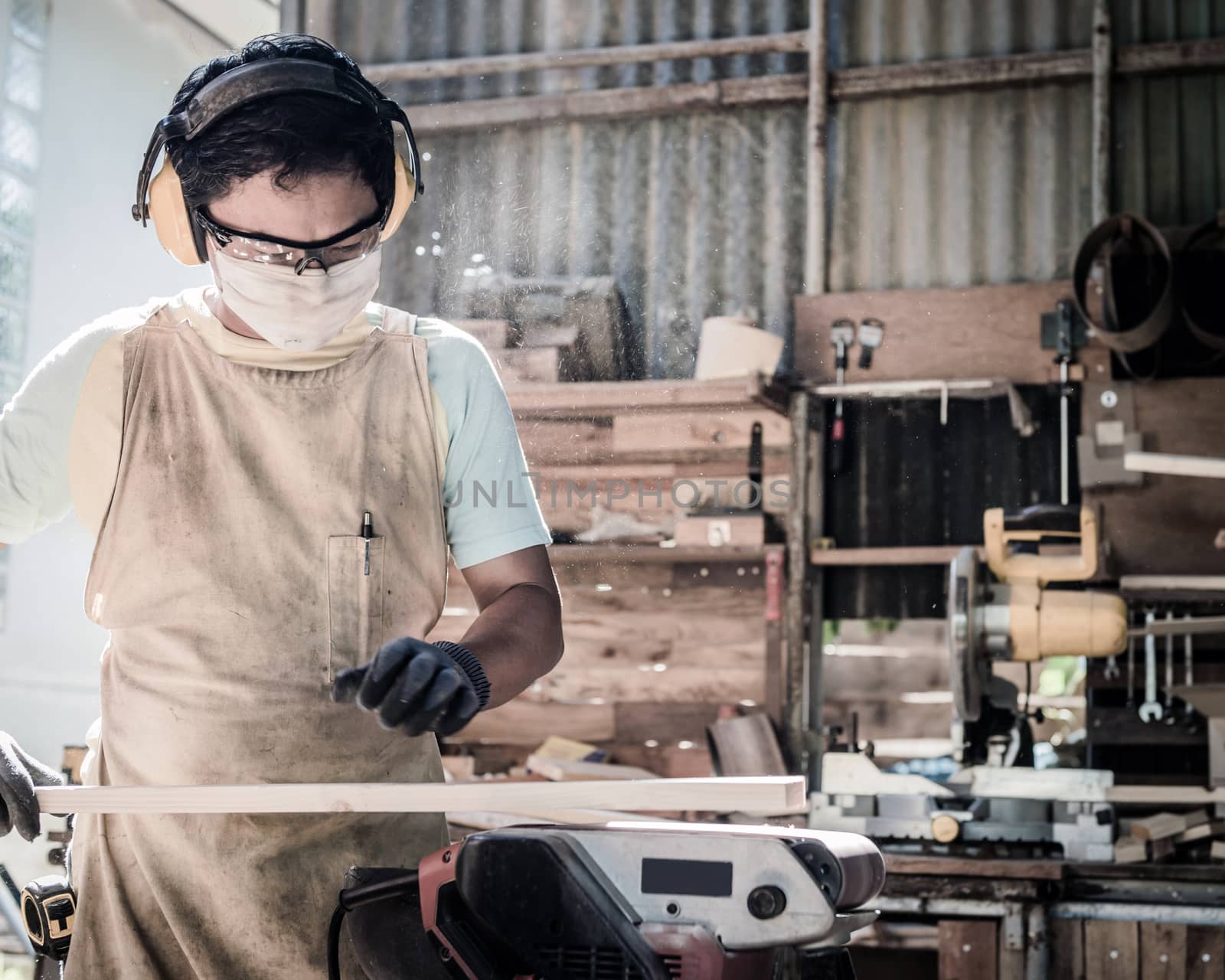 Portrait of carpenter man with him job