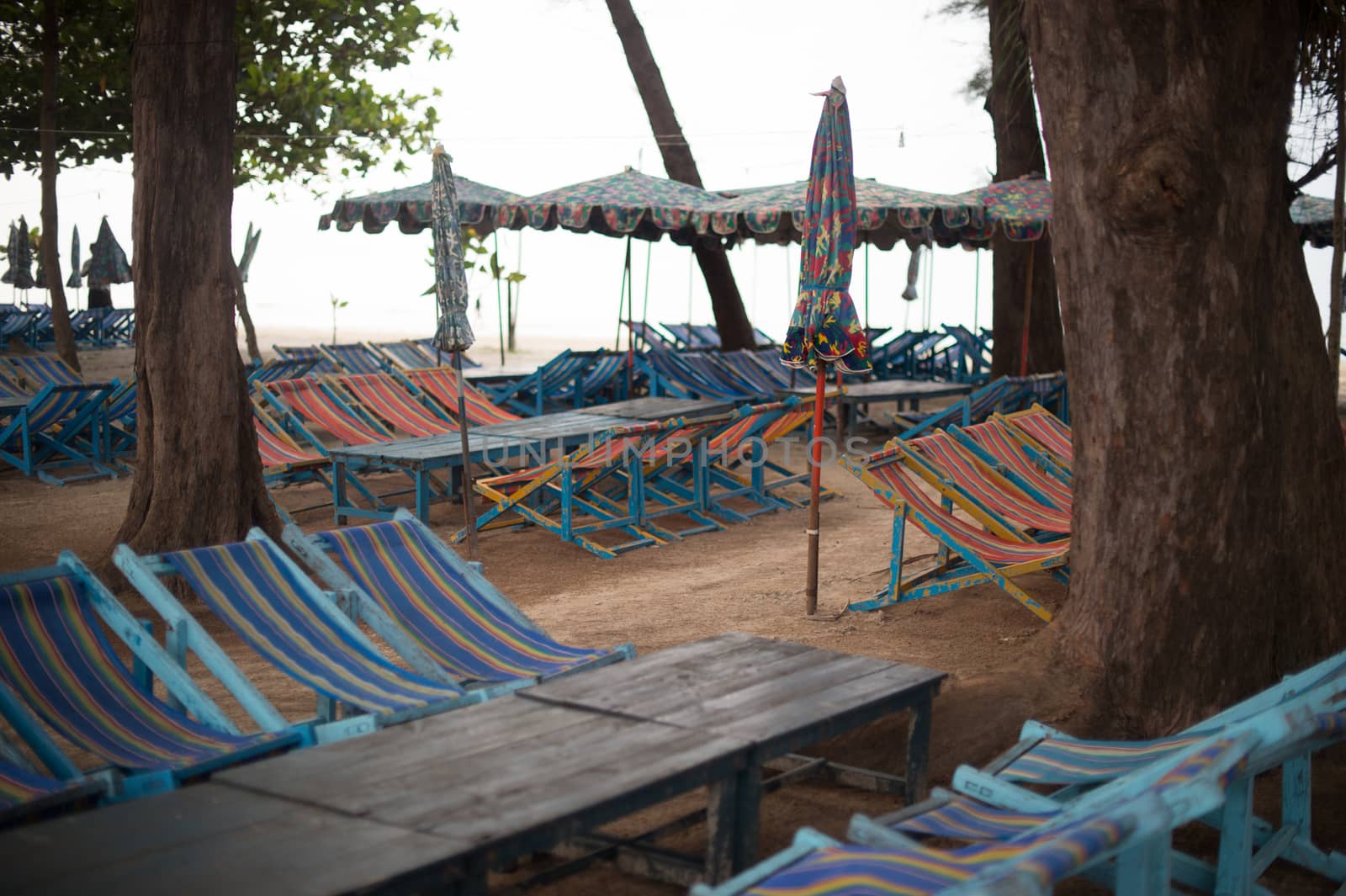 daybed and table on the beach