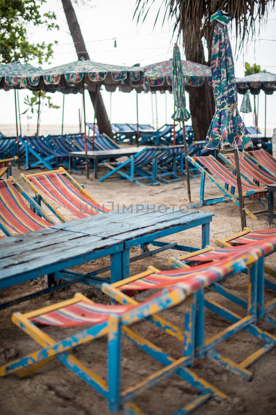 daybed and table on the beach