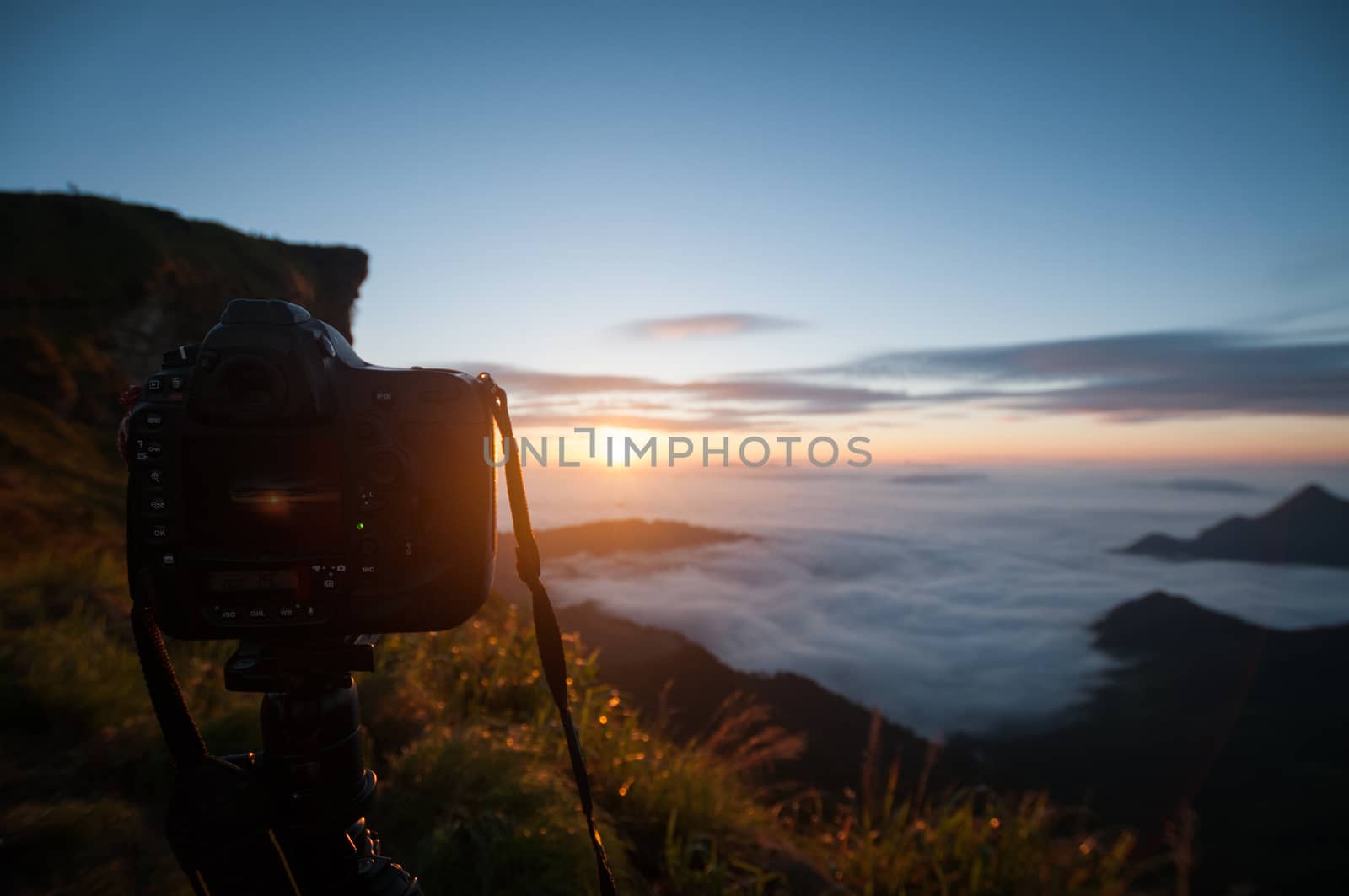 Camera take a photo of sunrise view landscape, Traveler conception.