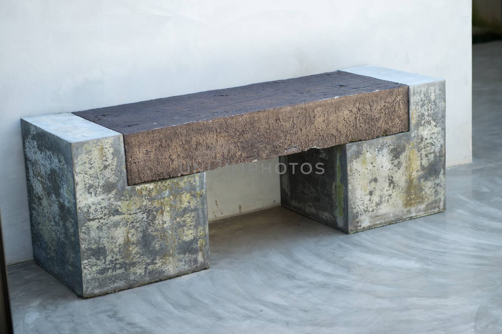 Closeup of concrete chair design by sayhmog