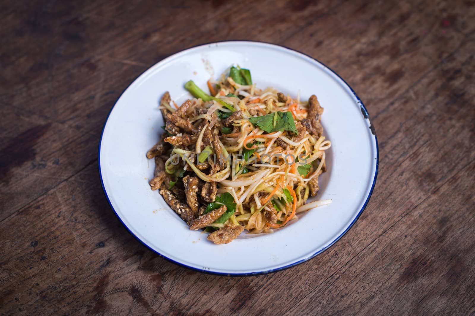 Closeup of asian food style on wooden floor by sayhmog