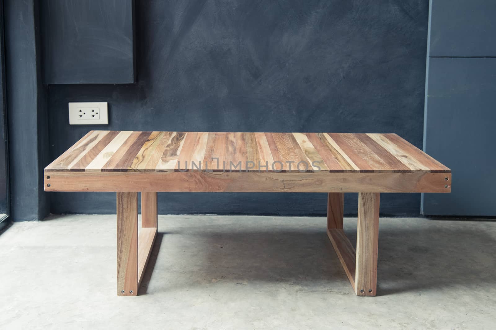 Closeup of wooden coffee table design for interior decorated